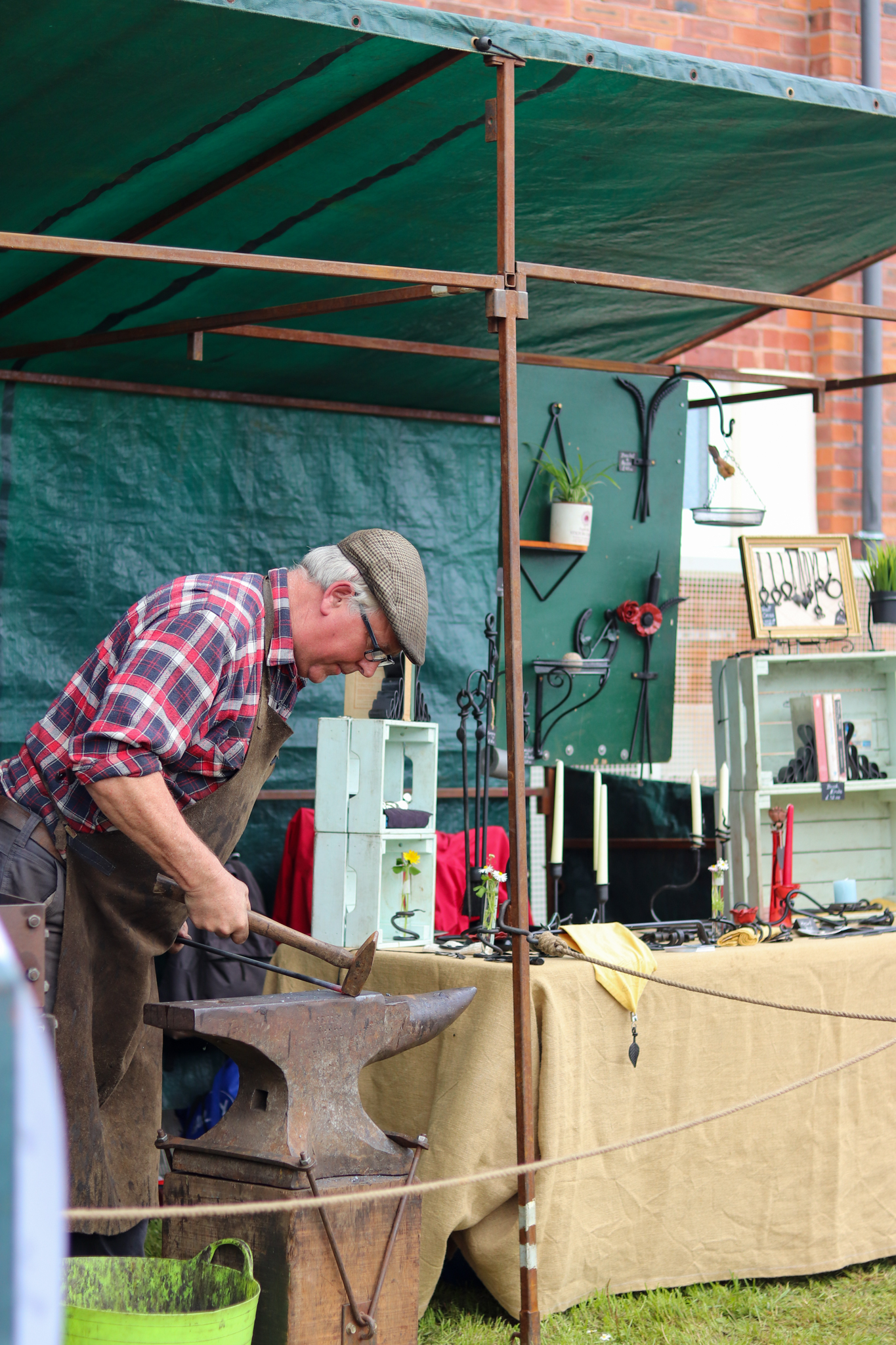 Local blacksmith at fete